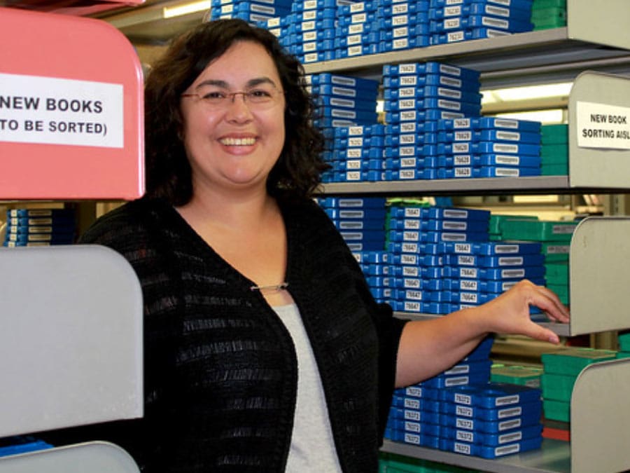 State employee working at the library