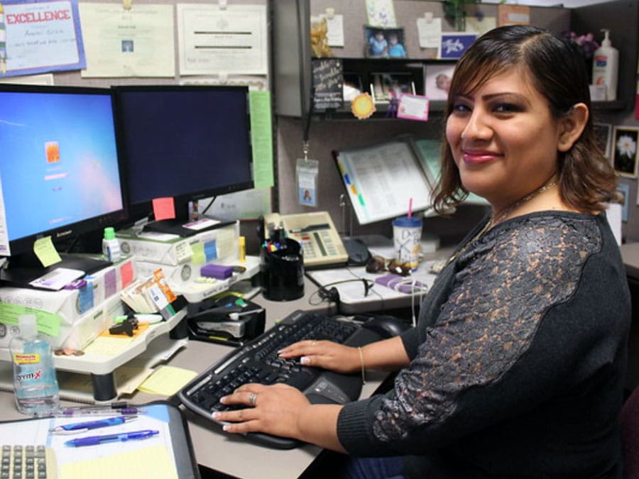 State employee working at her desk